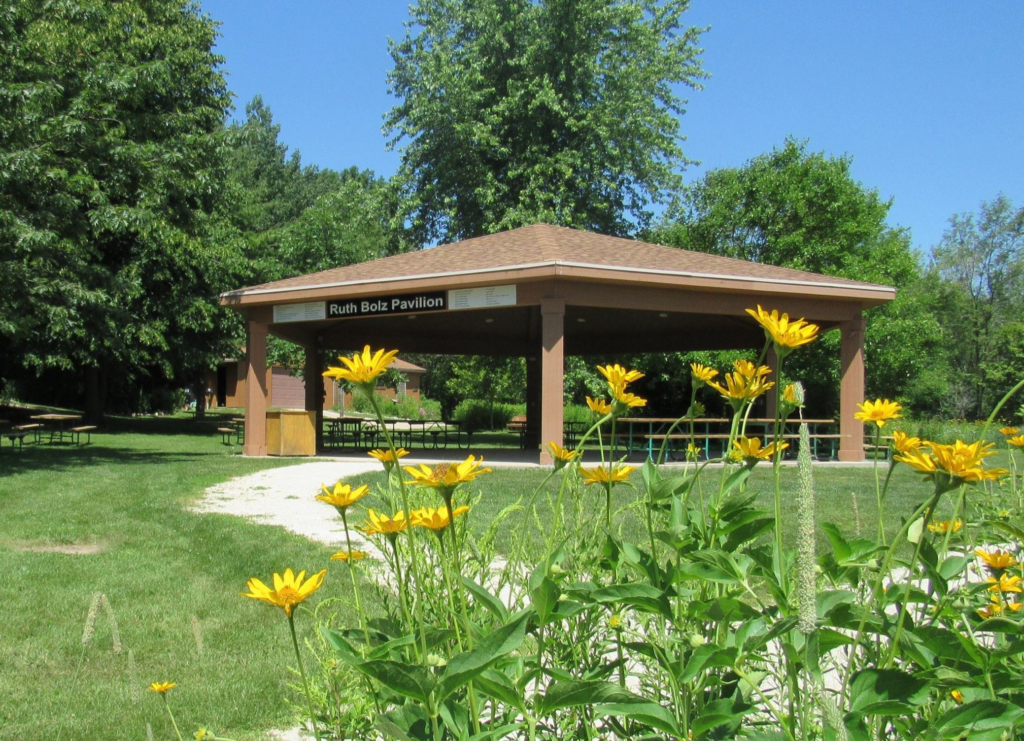 pavilion with prairie flowers near by